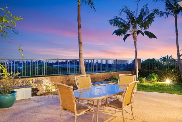 a view of balcony with furniture