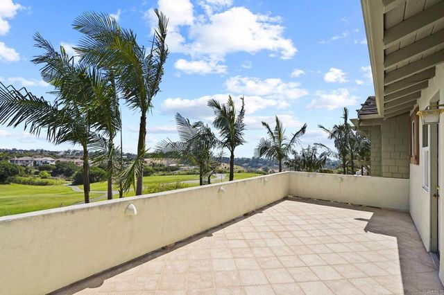 a bathroom with a bathtub and a window