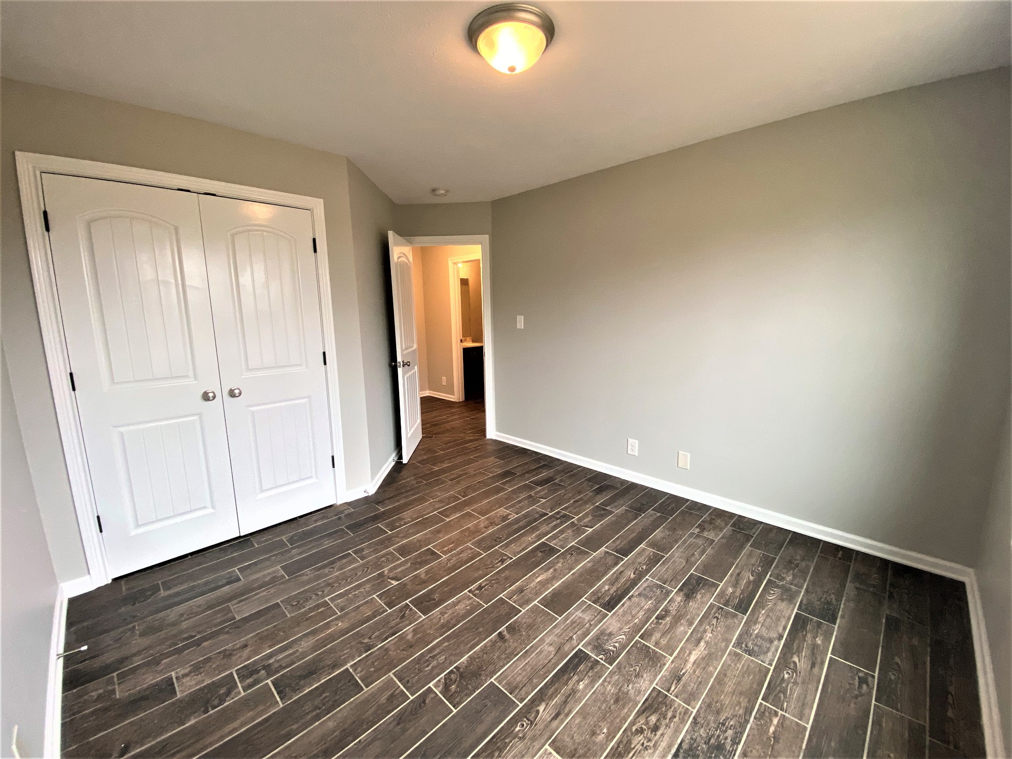 4200 Station Road Cunningham, TN 37052 - Photo 17 of 37 a view of an empty room and wooden floor