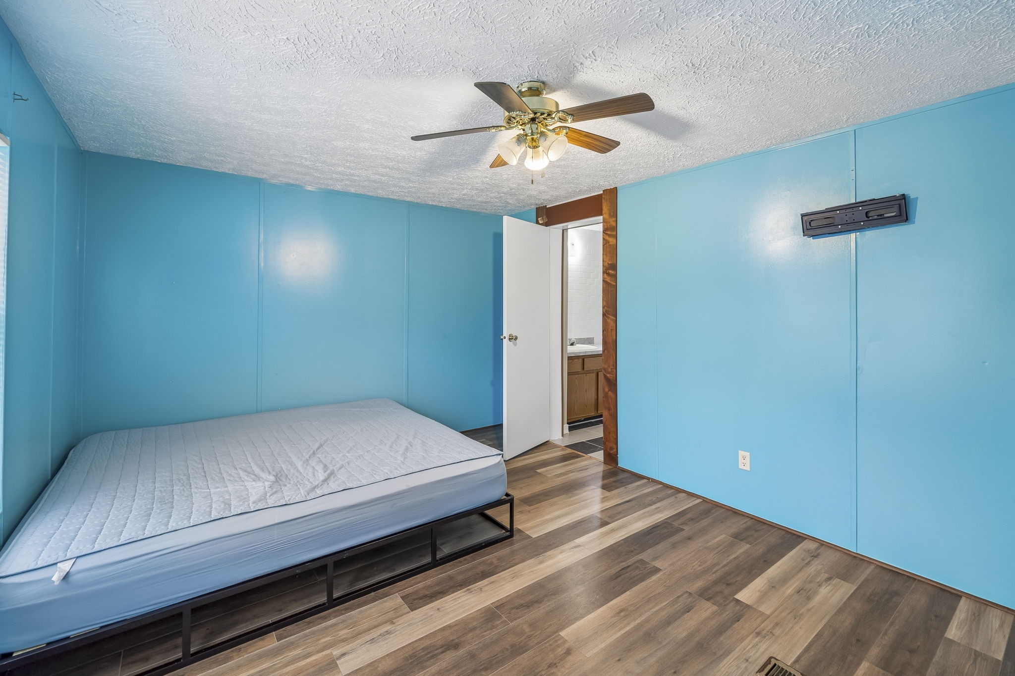 47 Riddleton Circle Riddleton, TN 37151 - Photo 15 of 46 a bedroom with a bed and a ceiling fan