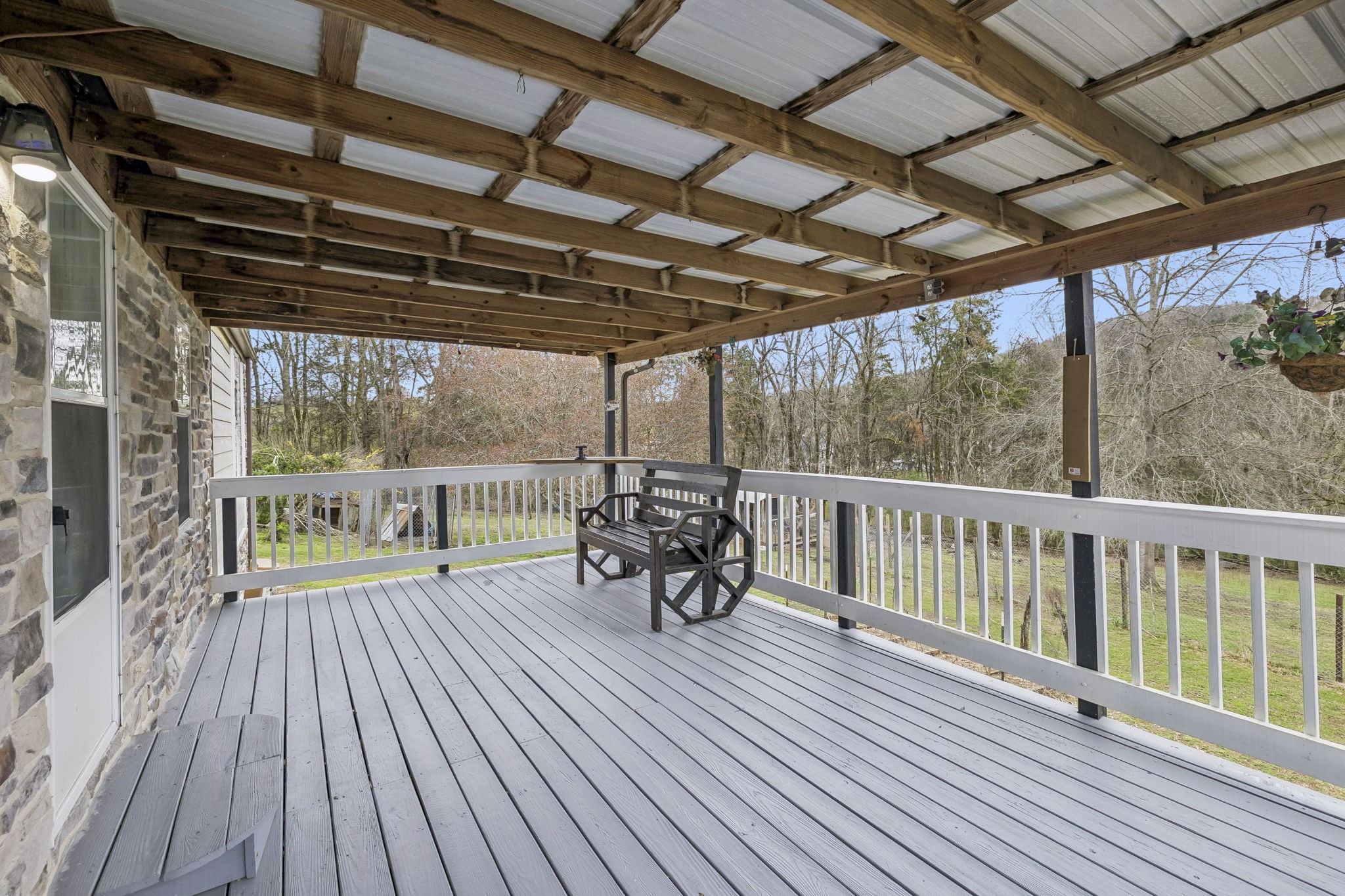 47 Riddleton Circle Riddleton, TN 37151 - Photo 39 of 46 a view of a balcony with wooden floor