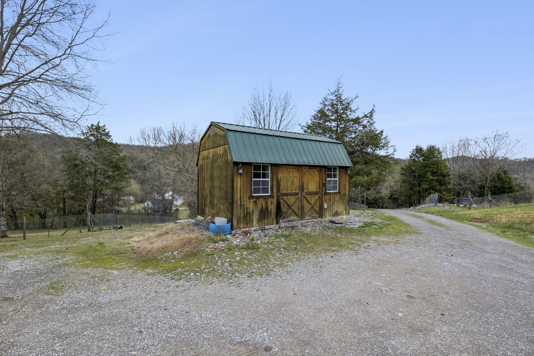 47 Riddleton Circle Riddleton, TN 37151 - Photo 40 of 46 a view of a house with backyard and trees