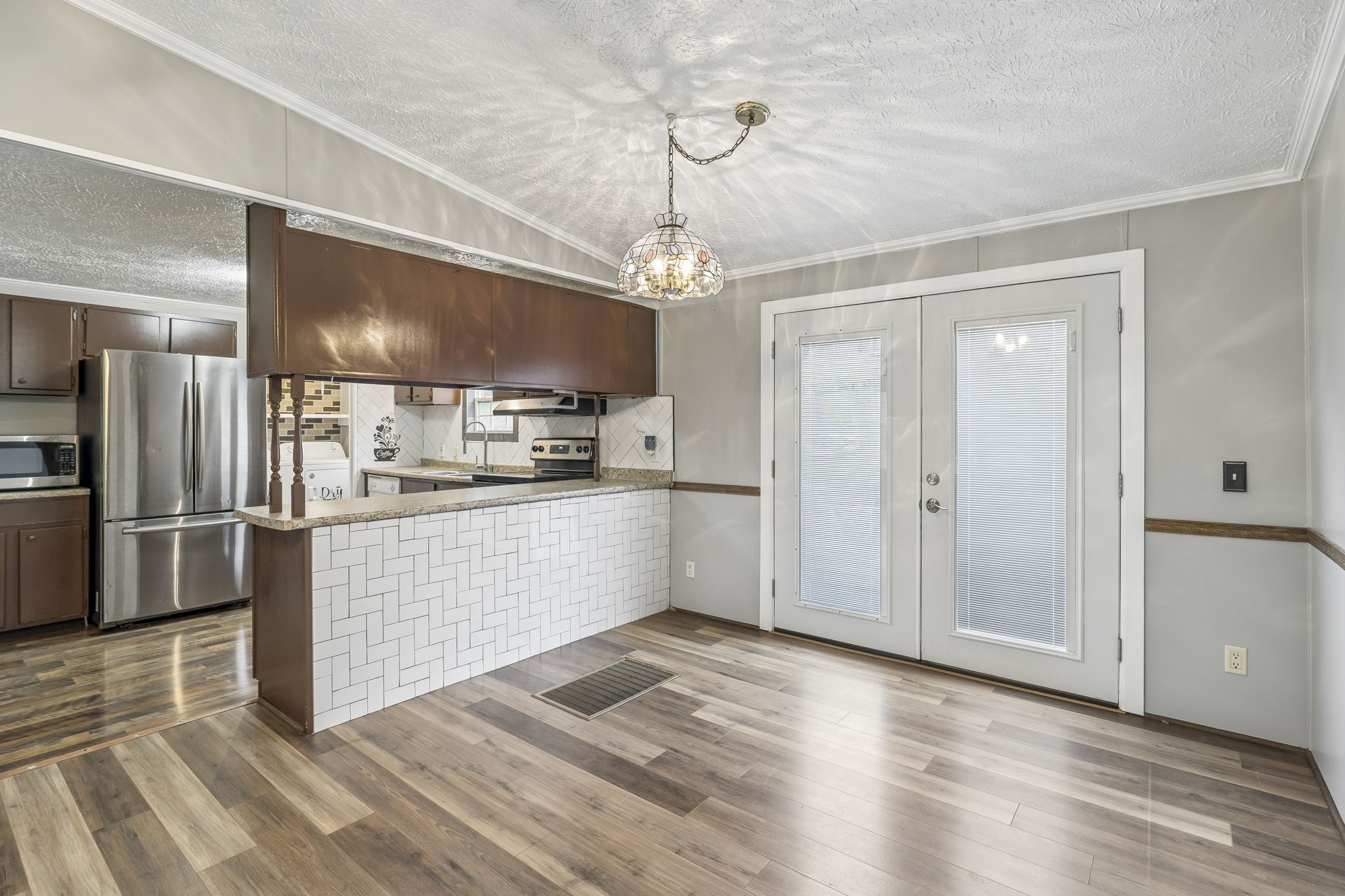 47 Riddleton Circle Riddleton, TN 37151 - Photo 7 of 46 a kitchen with stainless steel appliances granite countertop a refrigerator and a sink
