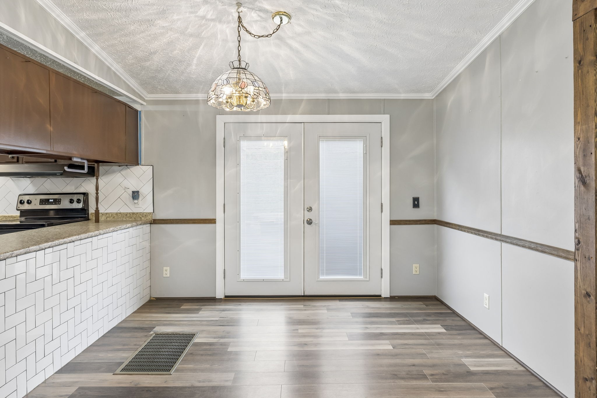 47 Riddleton Circle Riddleton, TN 37151 - Photo 8 of 46 a view of a kitchen with an empty space and a window