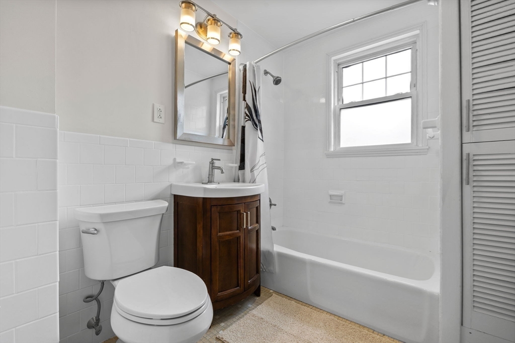 37 Fountain Road, Unit 2 Arlington, MA 02476 - Photo 11 of 25 a bathroom with a sink a toilet and bathtub