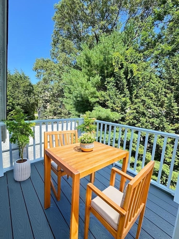 37 Fountain Road, Unit 2 Arlington, MA 02476 - Photo 16 of 25 a view of a patio with wooden floor
