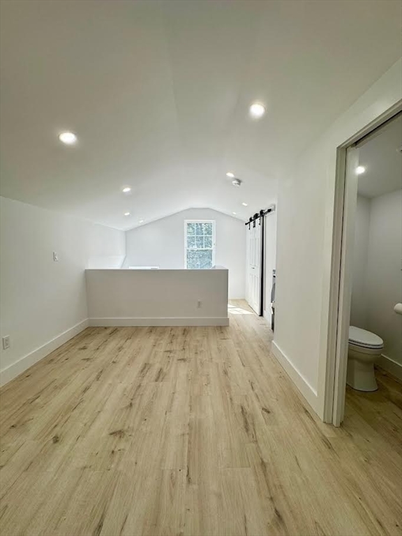 37 Fountain Road, Unit 2 Arlington, MA 02476 - Photo 22 of 25 a view of a room with wooden floor and bathroom