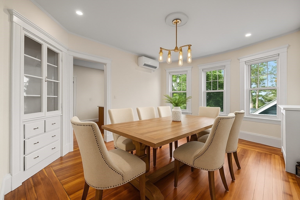 37 Fountain Road, Unit 2 Arlington, MA 02476 - Photo 6 of 25 a view of a dining room with furniture window and wooden floor