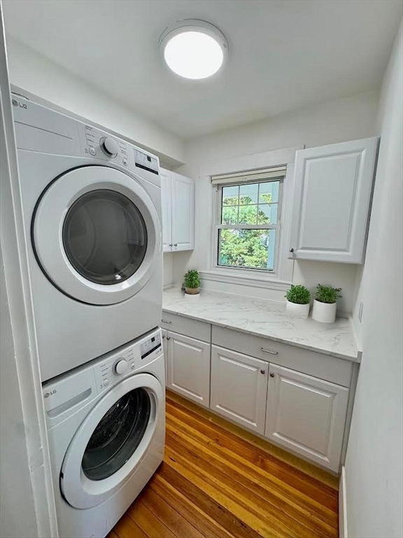 37 Fountain Road, Unit 2 Arlington, MA 02476 - Photo 8 of 25 a kitchen with a washer and dryer