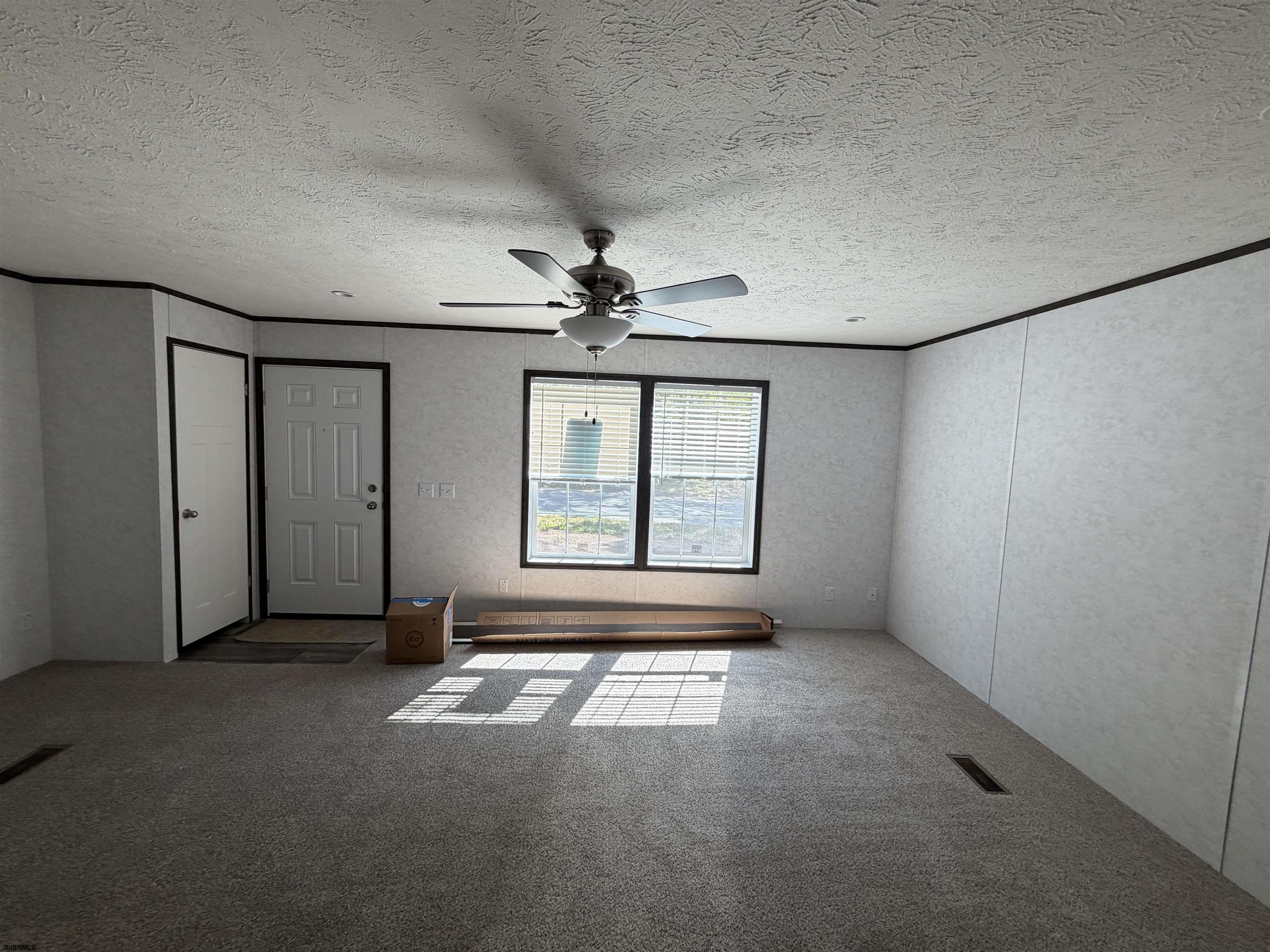 433 Poplar Road Laurel Lake, NJ 08332 - Photo 11 of 12 wooden floor and window in an empty room