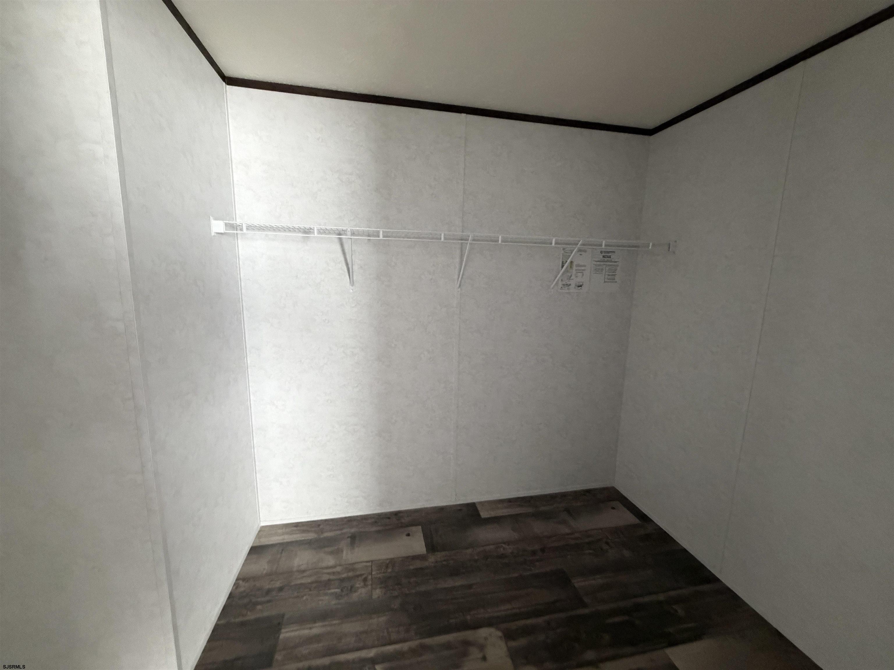 433 Poplar Road Laurel Lake, NJ 08332 - Photo 3 of 12 a view of a room with wooden floor