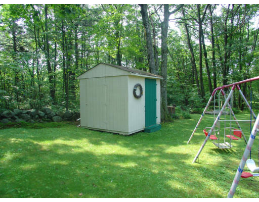 112 Knower Road Westminster, MA 01473 - Photo 3 of 10 a view of a backyard with a small house