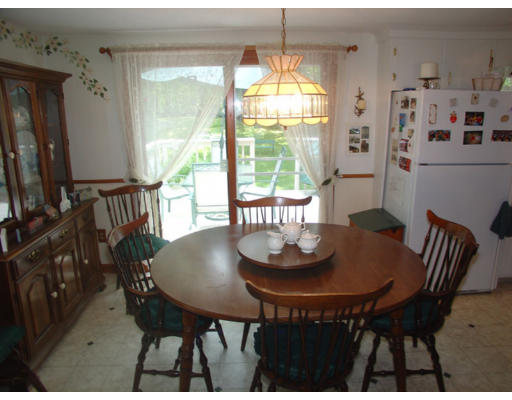112 Knower Road Westminster, MA 01473 - Photo 5 of 10 a view of a dining room with furniture window and outside view