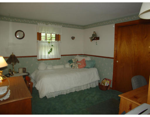 112 Knower Road Westminster, MA 01473 - Photo 8 of 10 a bedroom with a bed and windows