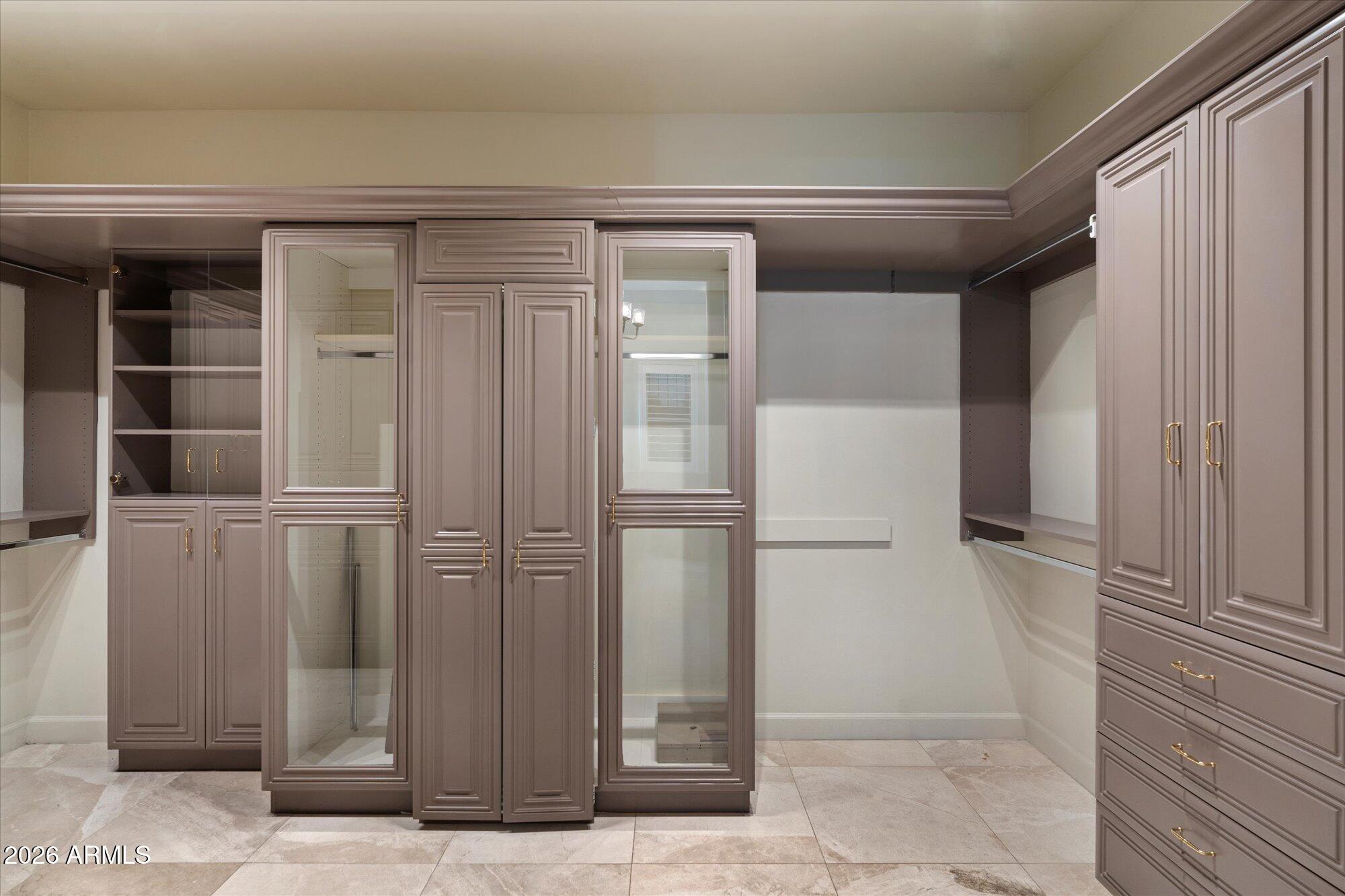 6123 West Alameda Road Glendale, AZ 85310 - Photo 32 of 39 a view of a refrigerator in kitchen and an empty room