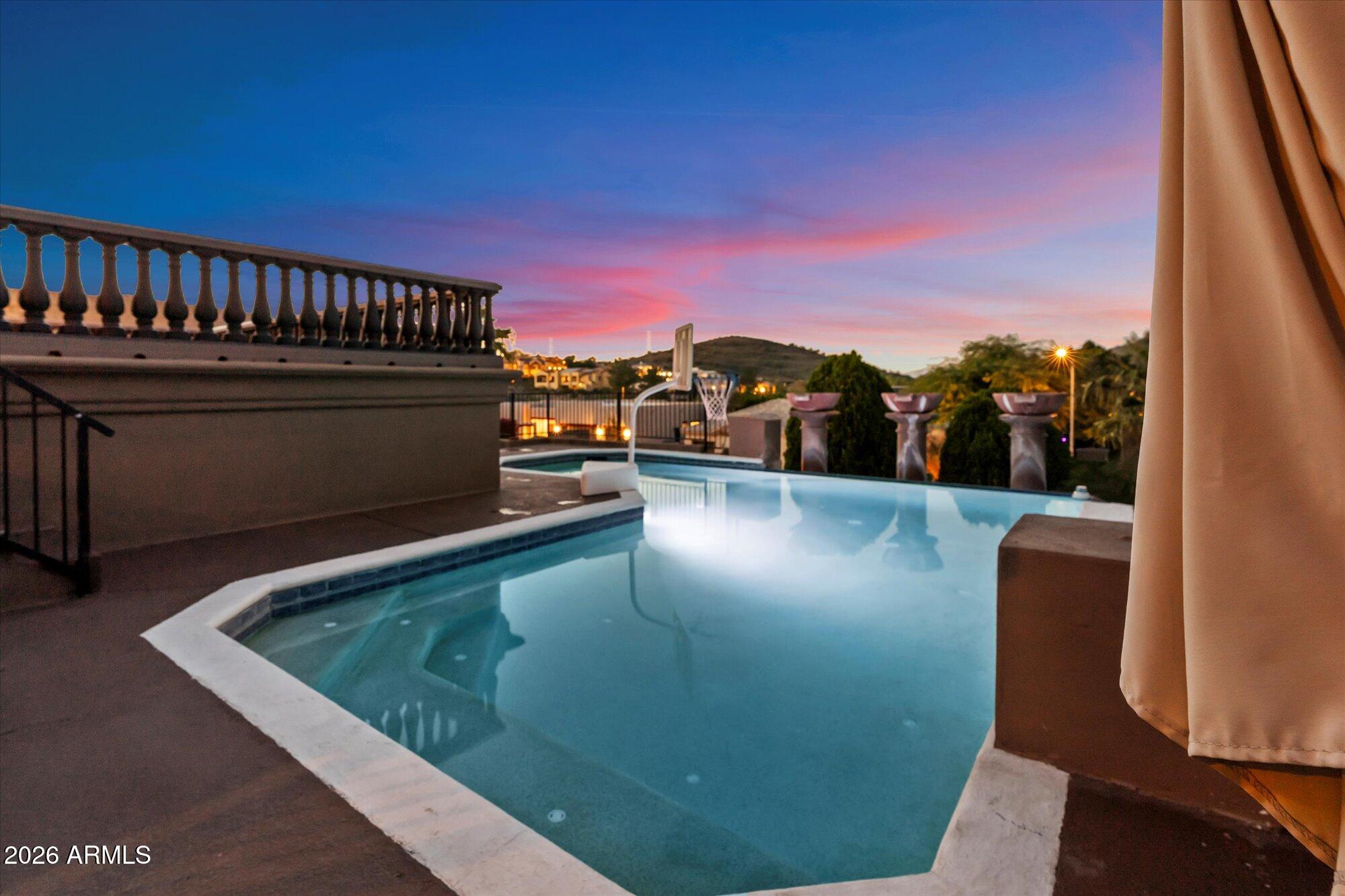 6123 West Alameda Road Glendale, AZ 85310 - Photo 5 of 39 a view of balcony with two chairs