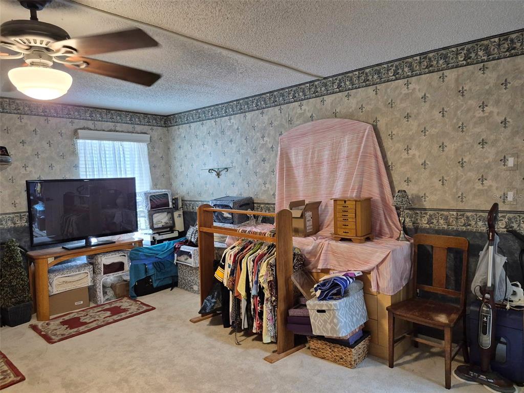 225 Country Club Drive, Unit C225 Largo, FL 33771 - Photo 17 of 26 a view of a room with gym equipment