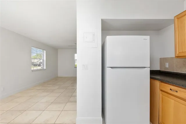 a view of kitchen and utility room