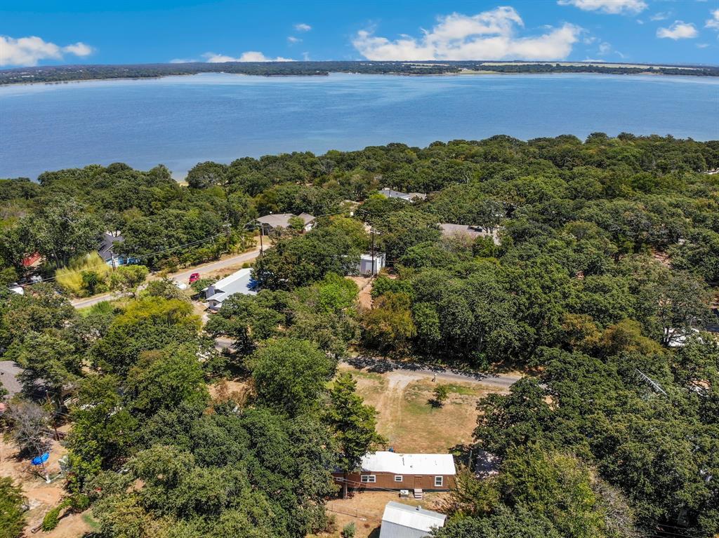 265 Robin Hood Road Gordonville, TX 76245 - Photo 29 of 34 3-5 min walk to Lake Texoma. Amazing water view from the front deck (November- March) when the leaves drop.
