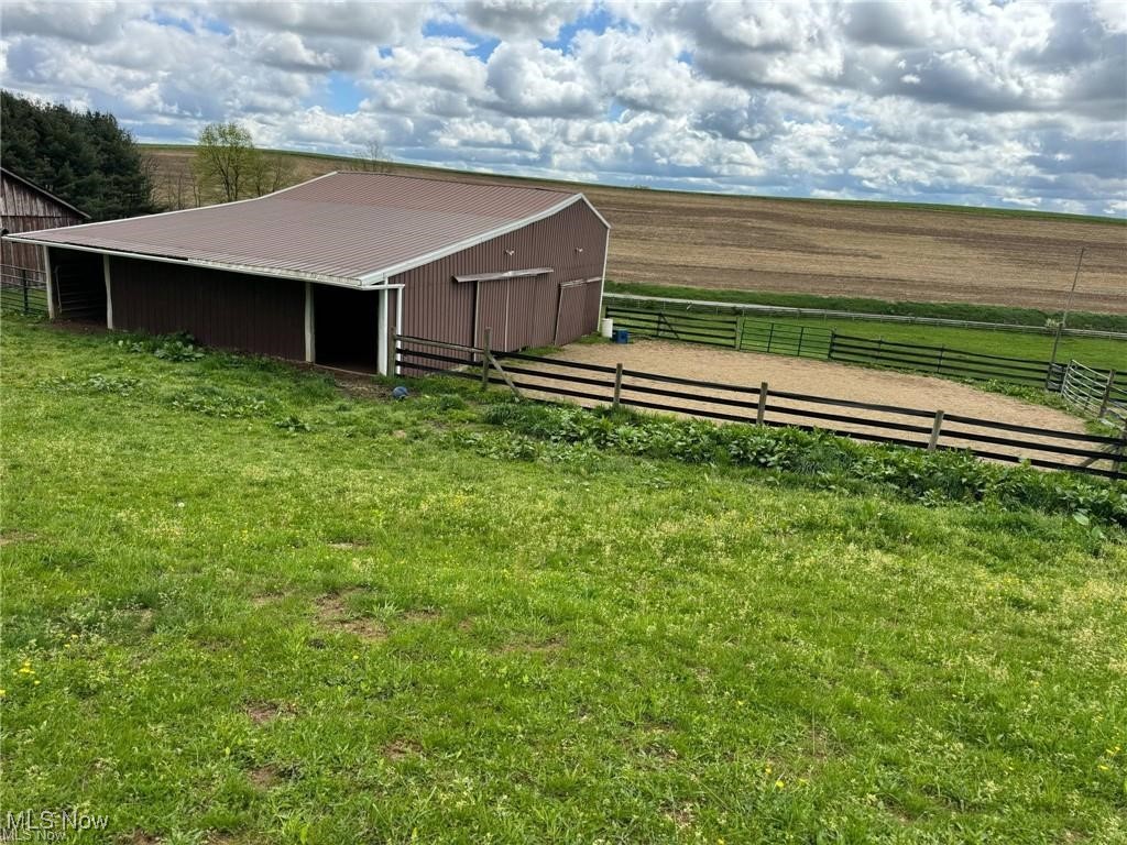 10097 March Road Northeast East Rochester, OH 44625 - Photo 25 of 34 View of pole building featuring an exterior structure and a view of countryside