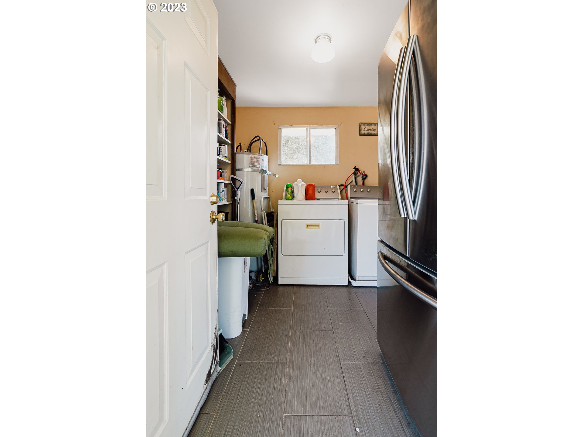 465 North 24th Street Springfield, OR 97477 - Photo 18 of 30 a kitchen with a refrigerator and a sink