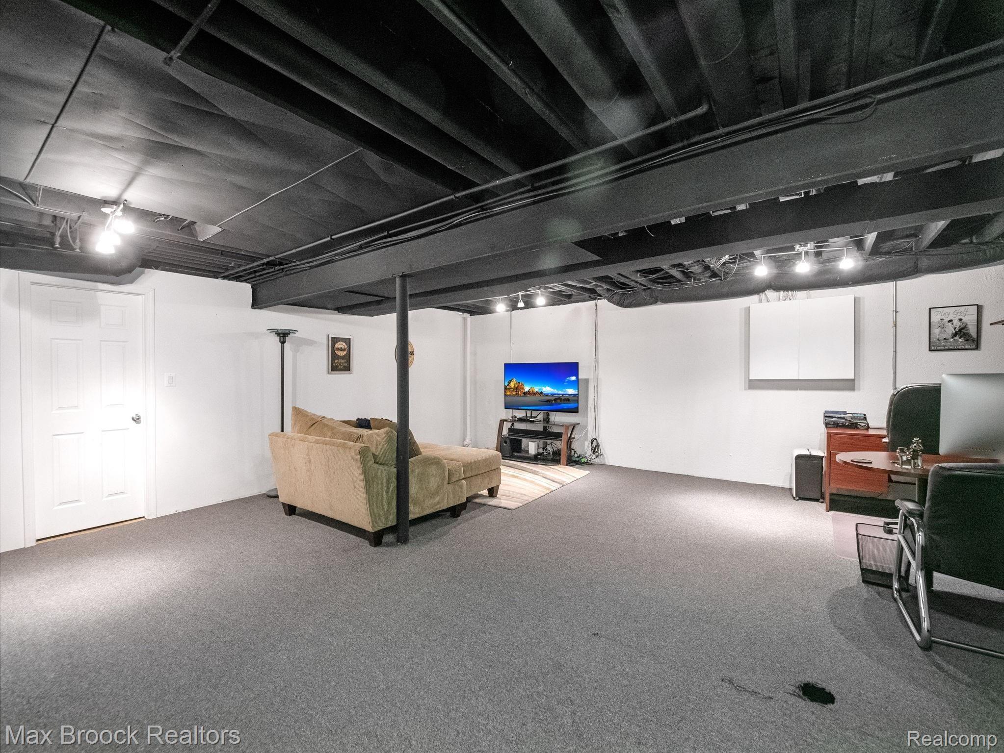 41491 Mitchell Road Novi, MI 48377 - Photo 21 of 28 Finished basement great additional space for playroom, office or entertaining.