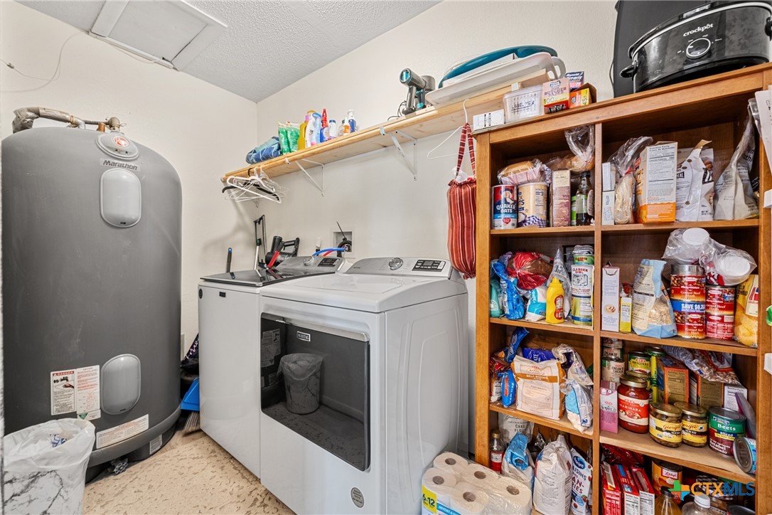 370 County Road 3106 Kempner, TX 76539 - Photo 17 of 34 a utility room with dryer and washer