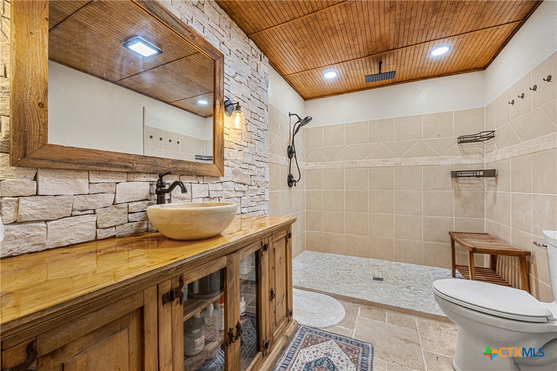 370 County Road 3106 Kempner, TX 76539 - Photo 20 of 34 a bathroom with a sink a toilet and shower
