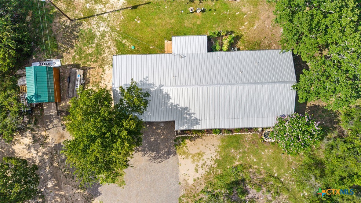 370 County Road 3106 Kempner, TX 76539 - Photo 7 of 34 an aerial view of residential house with pool and trees all around