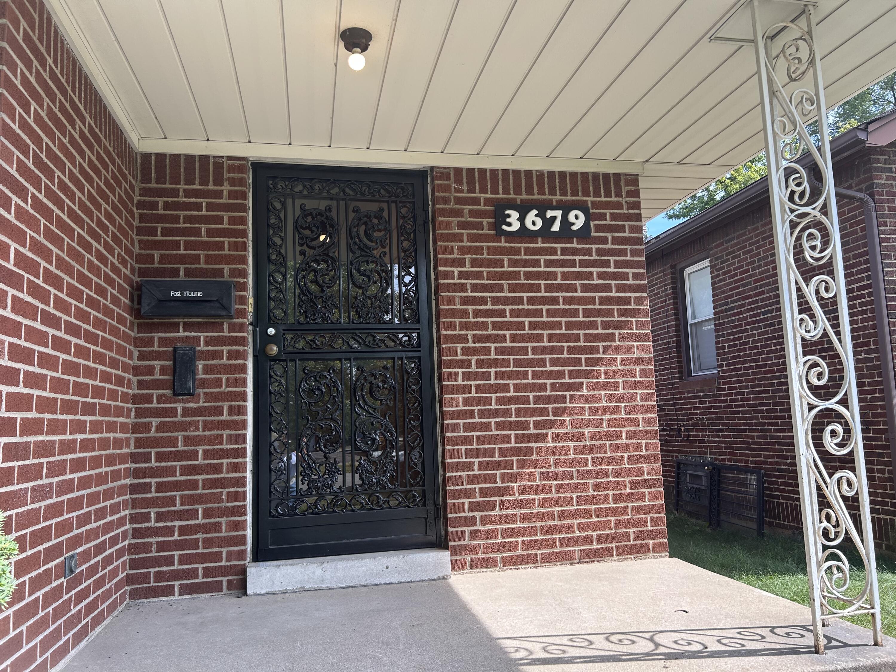 3679 Monroe Street Gary, IN 46408 - Photo 2 of 23 a bathroom with a shower