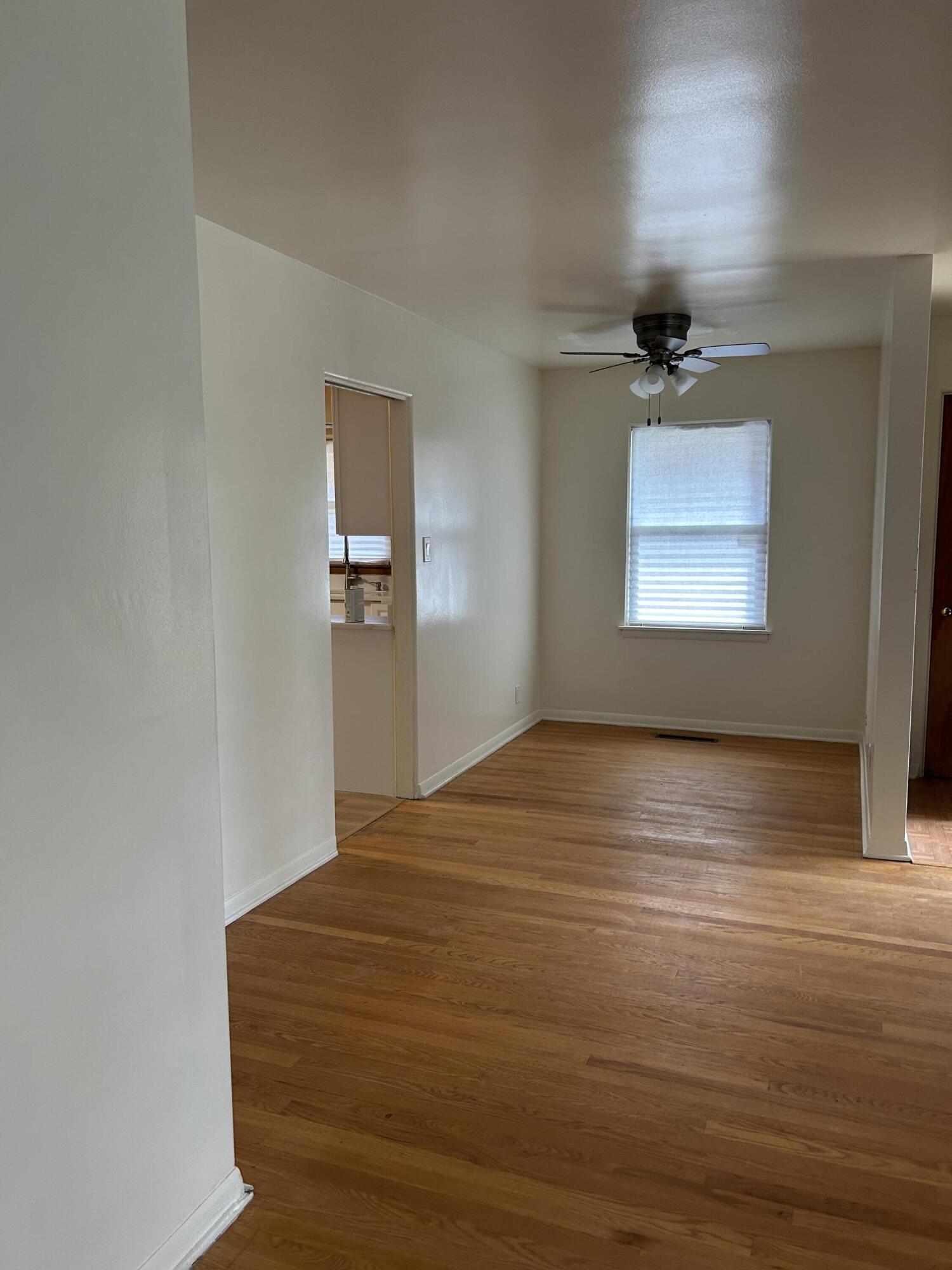 3679 Monroe Street Gary, IN 46408 - Photo 5 of 23 a view of an empty room with a window and closet