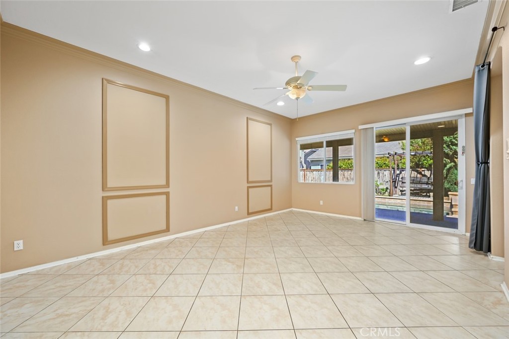 26764 Kingwood Road Murrieta, CA 92563 - Photo 23 of 42 a view of an empty room with a window