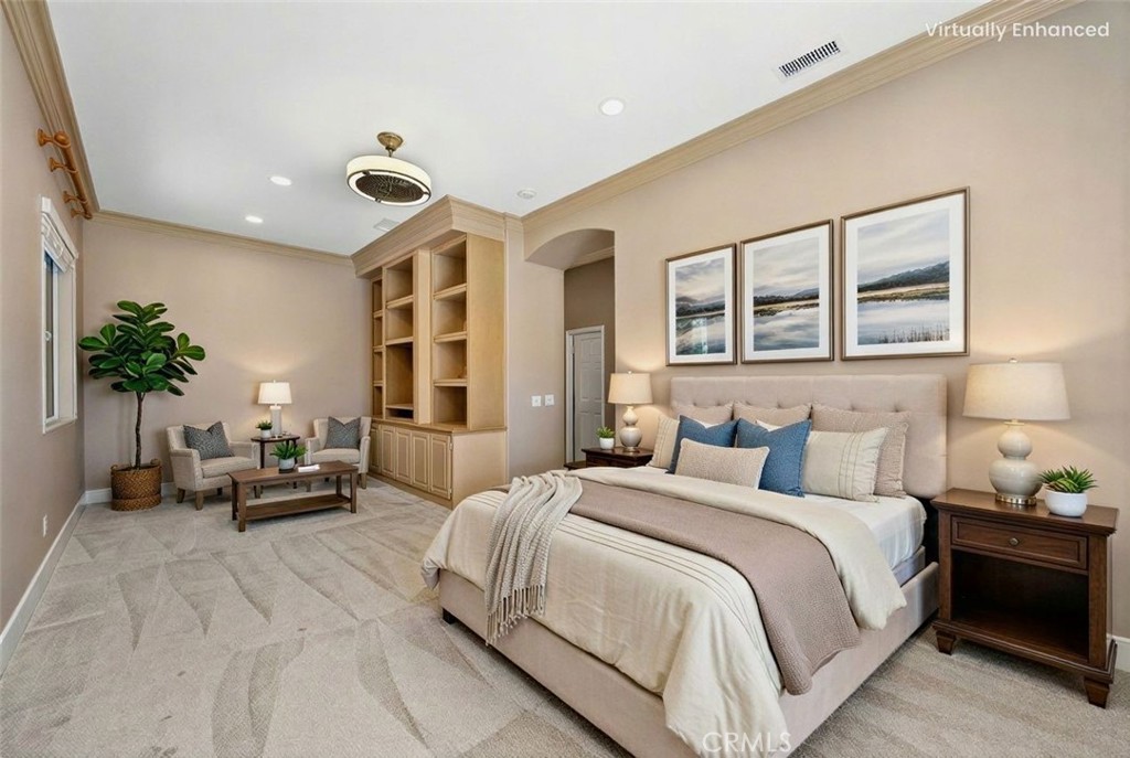 26764 Kingwood Road Murrieta, CA 92563 - Photo 28 of 42 a bedroom with bed and a potted plant