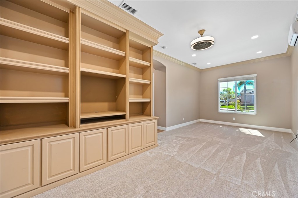 26764 Kingwood Road Murrieta, CA 92563 - Photo 29 of 42 a view of an empty room with a window