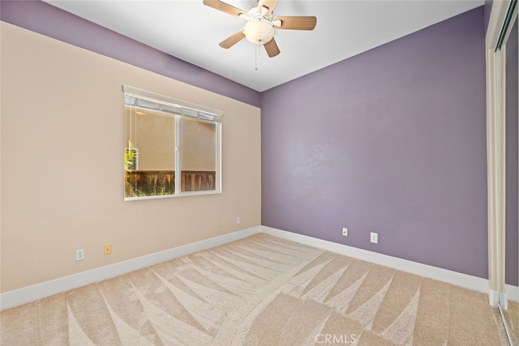 26764 Kingwood Road Murrieta, CA 92563 - Photo 32 of 42 a view of an empty room with a window