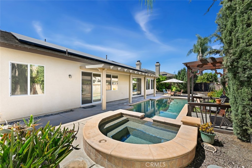 26764 Kingwood Road Murrieta, CA 92563 - Photo 36 of 42 a view of outdoor sitting area with furniture and wooden fence