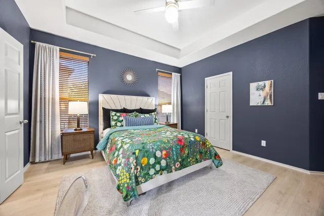 a bedroom with a bed and window