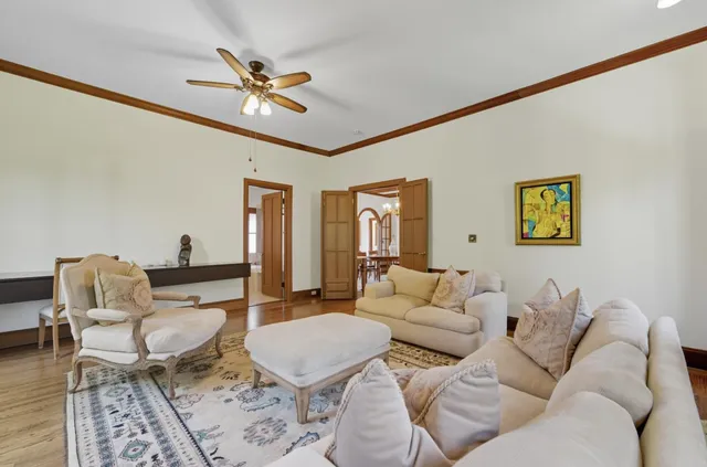 a en suite bathroom with double vanity and a window