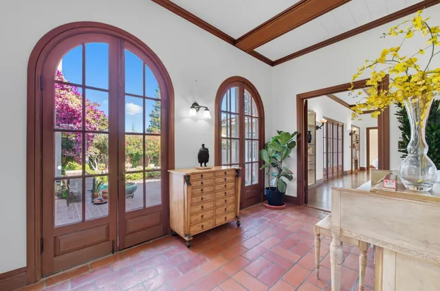 a view of an entryway with a staircase