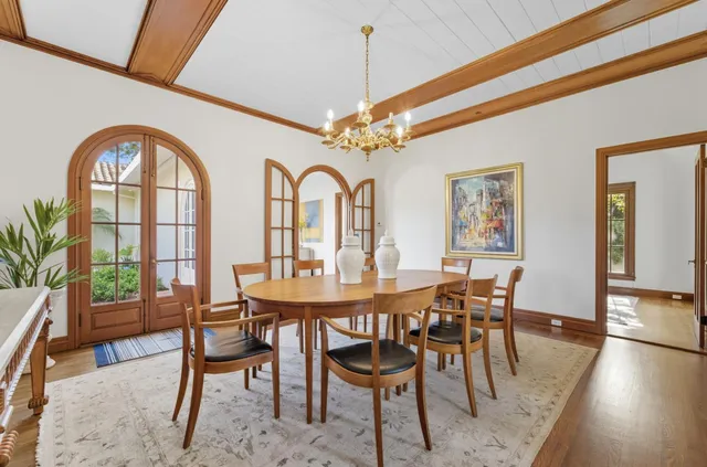 a kitchen with stainless steel appliances sink stove and cabinets