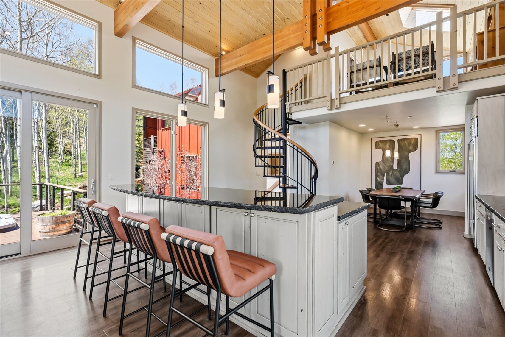 2800 Hunter's Knob Road Silverthorne, CO 80498 - Photo 10 of 37 a dining area with furniture and wooden floor