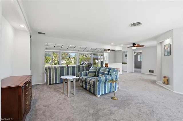 a kitchen with a sink and refrigerator