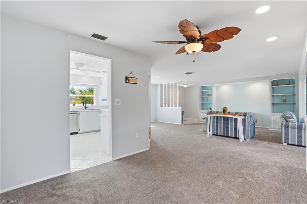 30 Maui Circle, Unit 30 Naples, FL 34112 - Photo 24 of 50 a view of livingroom with furniture and ceiling fan