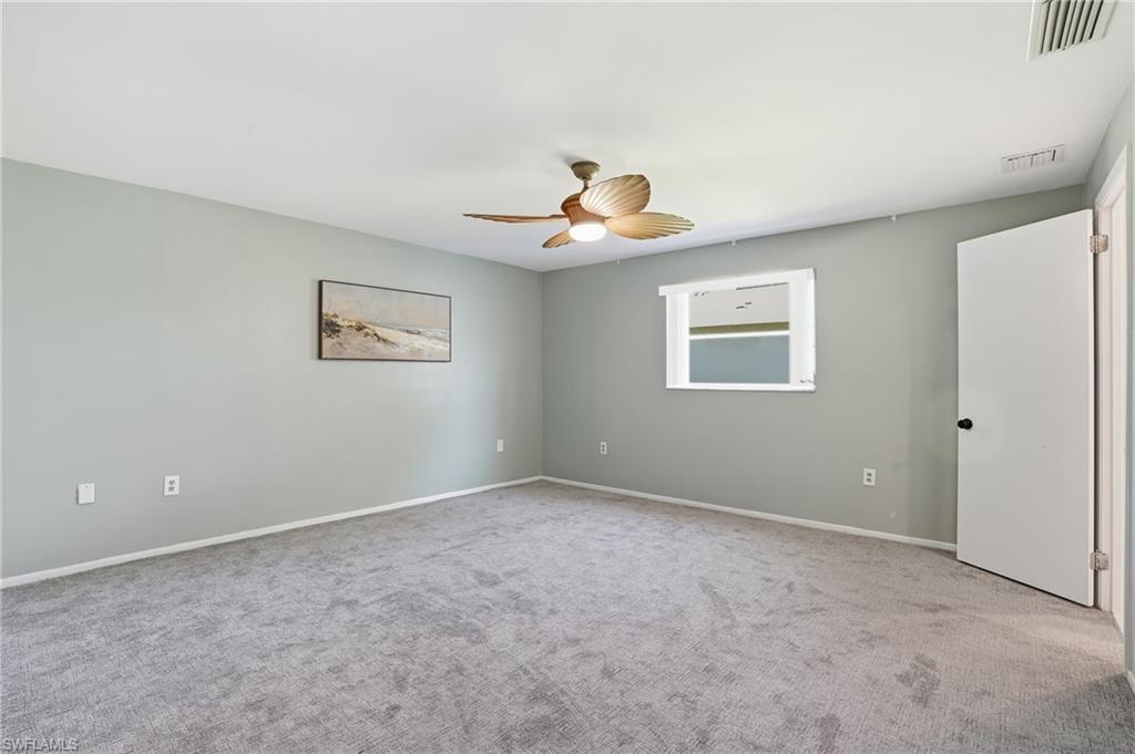 30 Maui Circle, Unit 30 Naples, FL 34112 - Photo 29 of 50 a view of a room with a window