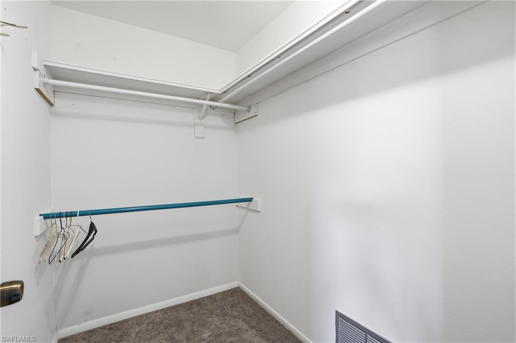 30 Maui Circle, Unit 30 Naples, FL 34112 - Photo 34 of 50 a view of small space with racks on the wall