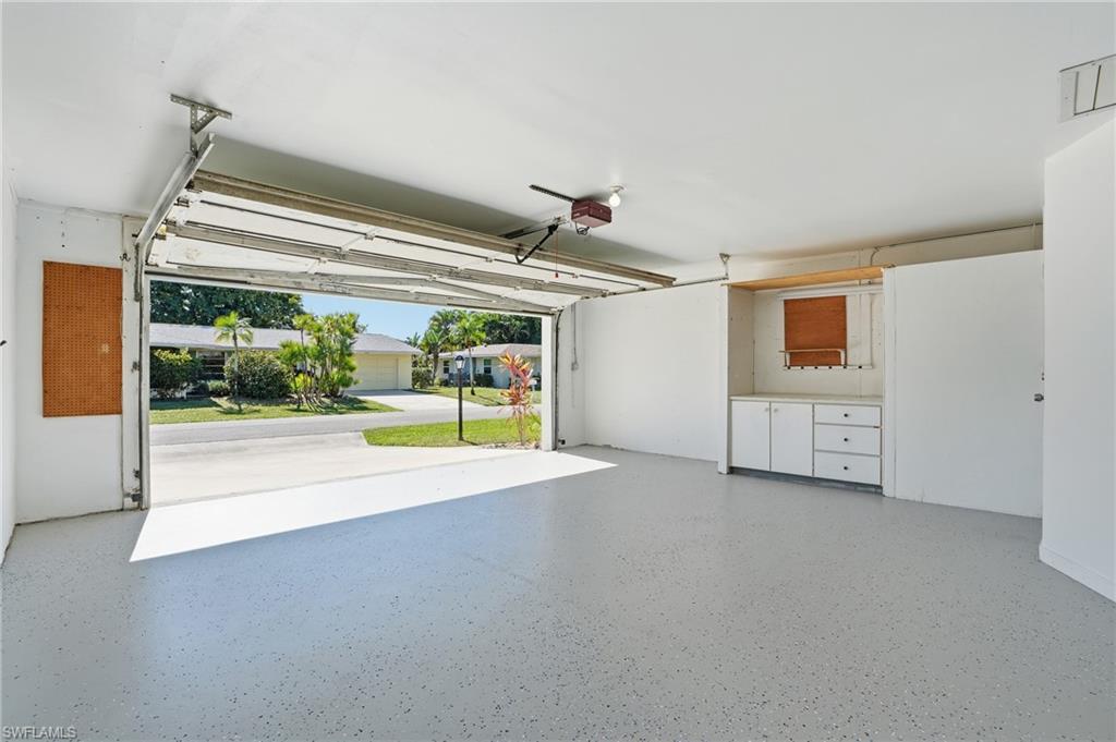 30 Maui Circle, Unit 30 Naples, FL 34112 - Photo 43 of 50 a view of a livingroom with an empty space and a porch