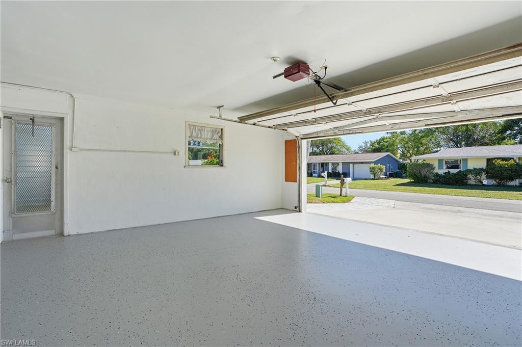 30 Maui Circle, Unit 30 Naples, FL 34112 - Photo 44 of 50 a view of a room with wooden floor and windows