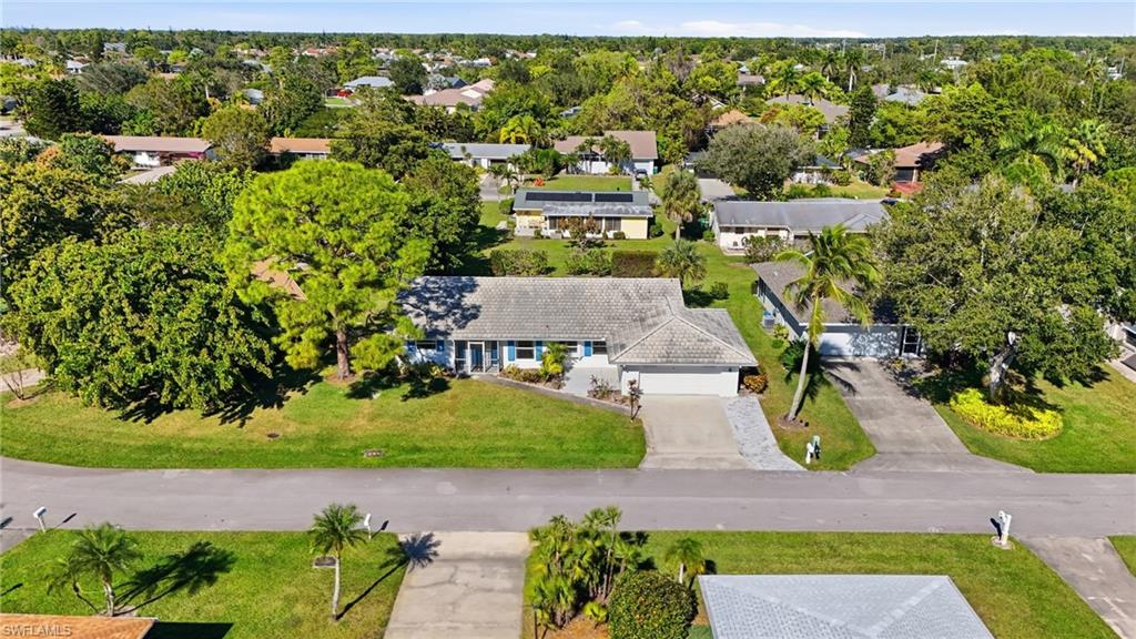 30 Maui Circle, Unit 30 Naples, FL 34112 - Photo 5 of 50 an aerial view of residential houses with outdoor space and trees