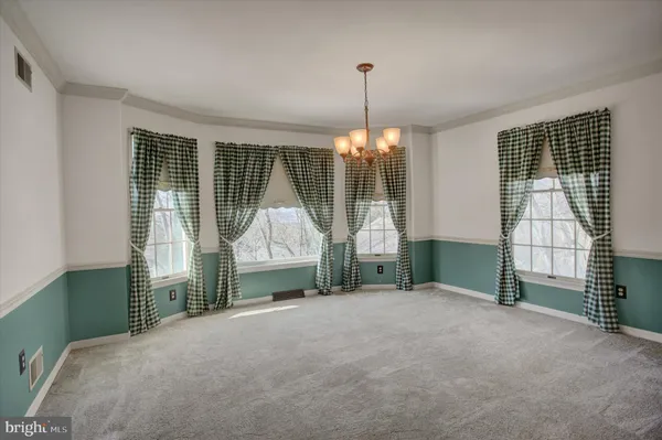 a view of a livingroom with furniture