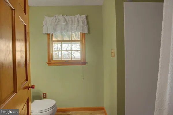 an aerial view of a house with swimming pool
